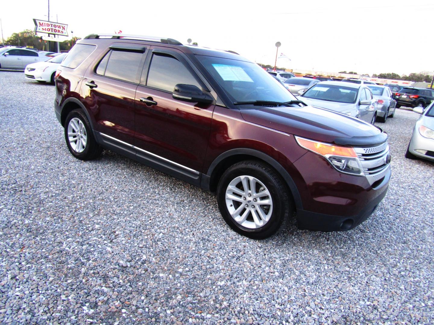 2012 Maroon /Tan Ford Explorer (1FMHK7D8XCG) , Automatic transmission, located at 15016 S Hwy 231, Midland City, AL, 36350, (334) 983-3001, 31.306210, -85.495277 - Photo#0